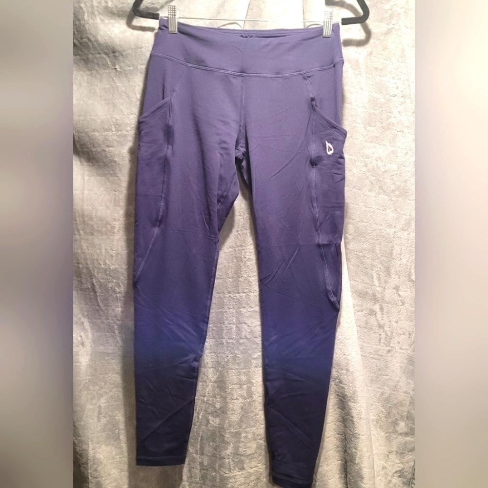 BALEAF size Medium workout leggings for women with 3 pockets.  Navy Blue